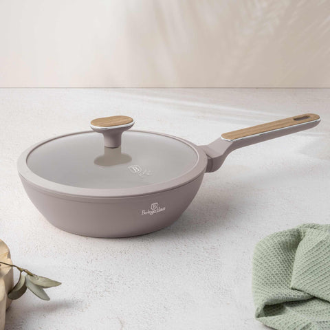 Product image of Deep frypan with lid 24cm. Part of the Taupe Nordic Collection . Features: • Material: forged aluminum with non-stick titanPro coating • Deep frypan with lid Ø24*6,5 cm 2,3L • Color: matt taupe, wooden REGISTERED DESIGN BY.... (Studio view). Official Berlinger Haus product, boosted by Promintra sl.