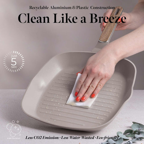Product image of Grill pan 28cm. Part of the Taupe Nordic Collection . Features: • Material: forged aluminum with non-stick titanPro coating • Grill pan Ø28*4,1 cm 2,1L • Color: matt taupe, wooden REGISTERED DESIGN BY BERLINGER .... (Studio view). Official Berlinger Haus product, boosted by Promintra sl.