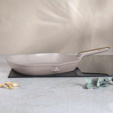Product image of Grill pan 28cm. Part of the Taupe Nordic Collection . Features: • Material: forged aluminum with non-stick titanPro coating • Grill pan Ø28*4,1 cm 2,1L • Color: matt taupe, wooden REGISTERED DESIGN BY BERLINGER .... (Studio view). Official Berlinger Haus product, boosted by Promintra sl.