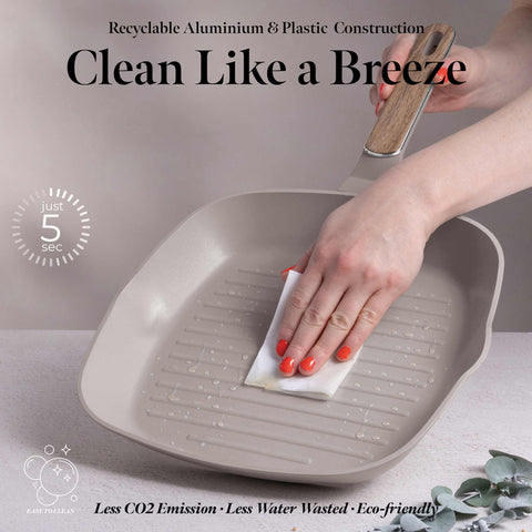 Product image of Grill pan with lid 28cm. Part of the Taupe Nordic Collection . Features: • Material: forged aluminum with non-stick titanPro coating • Grill pan with lid Ø28*4,1 cm 2,1L • Color: matt taupe, wooden REGISTERED DESIGN BY B.... (Studio view). Official Berlinger Haus product, boosted by Promintra sl.