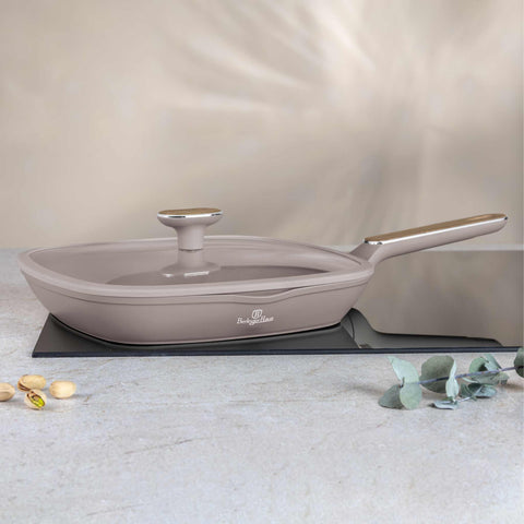 Product image of Grill pan with lid 28cm. Part of the Taupe Nordic Collection . Features: • Material: forged aluminum with non-stick titanPro coating • Grill pan with lid Ø28*4,1 cm 2,1L • Color: matt taupe, wooden REGISTERED DESIGN BY B.... (Studio view). Official Berlinger Haus product, boosted by Promintra sl.