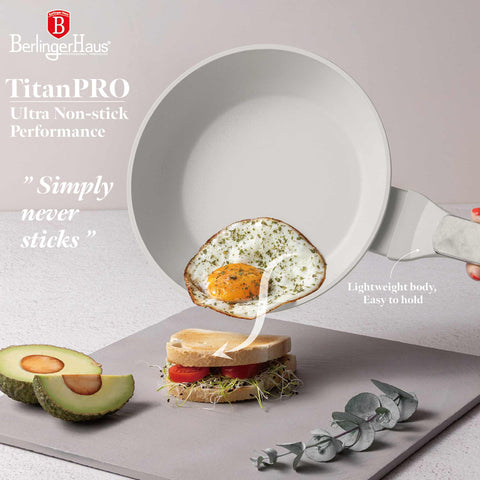 Product image of Frypan 20cm. Part of the Sahara Marble Collection . Features: • Material: forged aluminum with non-stick titanPro coating • Frypan Ø20*4,5 cm 1,0L • Color: matt cream, marble REGISTERED DESIGN BY BERLINGER HAUS!. (Studio view). Official Berlinger Haus product, boosted by Promintra sl.