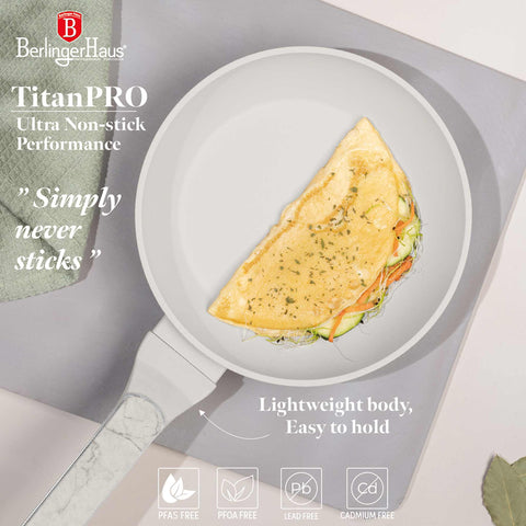 Product image of Frypan 20cm. Part of the Sahara Marble Collection . Features: • Material: forged aluminum with non-stick titanPro coating • Frypan Ø20*4,5 cm 1,0L • Color: matt cream, marble REGISTERED DESIGN BY BERLINGER HAUS!. (Studio view). Official Berlinger Haus product, boosted by Promintra sl.
