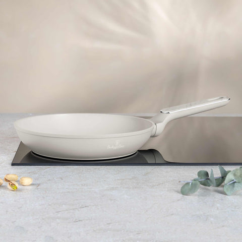 Product image of Frypan 24cm. Part of the Sahara Marble Collection . Features: • Material: forged aluminum with non-stick titanPro coating • Frypan Ø24*4,8 cm 1,7L • Color: matt cream, marble REGISTERED DESIGN BY BERLINGER HAUS!. (Studio view). Official Berlinger Haus product, boosted by Promintra sl.