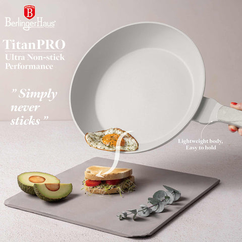Product image of Frypan 28cm. Part of the Sahara Marble Collection . Features: • Material: forged aluminum with non-stick titanPro coating • Frypan Ø28*5,2 cm 2,4L • Color: matt cream, marble REGISTERED DESIGN BY BERLINGER HAUS!. (Studio view). Official Berlinger Haus product, boosted by Promintra sl.