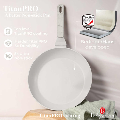 Product image of Frypan 28cm. Part of the Sahara Marble Collection . Features: • Material: forged aluminum with non-stick titanPro coating • Frypan Ø28*5,2 cm 2,4L • Color: matt cream, marble REGISTERED DESIGN BY BERLINGER HAUS!. (Studio view). Official Berlinger Haus product, boosted by Promintra sl.