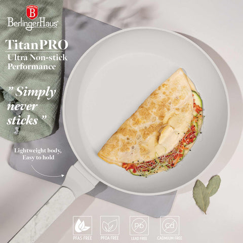 Product image of Frypan 28cm. Part of the Sahara Marble Collection . Features: • Material: forged aluminum with non-stick titanPro coating • Frypan Ø28*5,2 cm 2,4L • Color: matt cream, marble REGISTERED DESIGN BY BERLINGER HAUS!. (Studio view). Official Berlinger Haus product, boosted by Promintra sl.