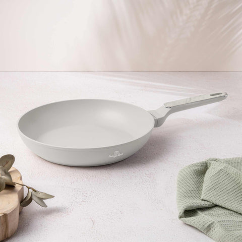 Product image of Frypan 28cm. Part of the Sahara Marble Collection . Features: • Material: forged aluminum with non-stick titanPro coating • Frypan Ø28*5,2 cm 2,4L • Color: matt cream, marble REGISTERED DESIGN BY BERLINGER HAUS!. (Studio view). Official Berlinger Haus product, boosted by Promintra sl.