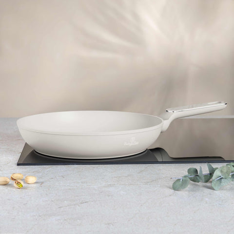Product image of Frypan 28cm. Part of the Sahara Marble Collection . Features: • Material: forged aluminum with non-stick titanPro coating • Frypan Ø28*5,2 cm 2,4L • Color: matt cream, marble REGISTERED DESIGN BY BERLINGER HAUS!. (Studio view). Official Berlinger Haus product, boosted by Promintra sl.