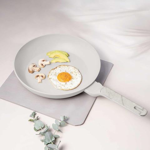 Product image of Frypan 28cm. Part of the Sahara Marble Collection . Features: • Material: forged aluminum with non-stick titanPro coating • Frypan Ø28*5,2 cm 2,4L • Color: matt cream, marble REGISTERED DESIGN BY BERLINGER HAUS!. (Studio view). Official Berlinger Haus product, boosted by Promintra sl.