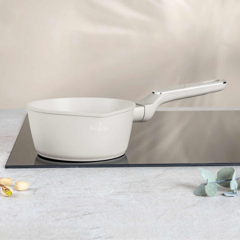 Product image of Sauce pan 16cm. Part of the Sahara Marble Collection . Features: • Material: forged aluminum with non-stick titanPro coating • Sauce pan Ø16*7,5 cm 1,2L • Color: matt cream, marble REGISTERED DESIGN BY BERLINGER .... (Studio view). Official Berlinger Haus product, boosted by Promintra sl.