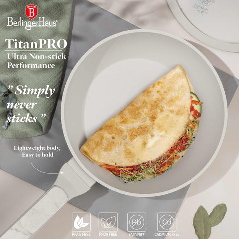 Product image of Deep frypan with lid 24cm. Part of the Sahara Marble Collection . Features: • Material: forged aluminum with non-stick titanPro coating • Deep frypan with lid Ø24*6,5 cm 2,3L • Color: matt cream, marble REGISTERED DESIGN BY.... (Studio view). Official Berlinger Haus product, boosted by Promintra sl.