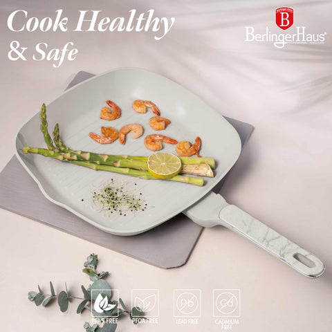 Product image of Grill pan 28cm. Part of the Sahara Marble Collection . Features: • Material: forged aluminum with non-stick titanPro coating • Grill pan Ø28*4,1 cm 2,1L • Color: matt cream, marble REGISTERED DESIGN BY BERLINGER .... (Conceptual view). Official Berlinger Haus product, boosted by Promintra sl.