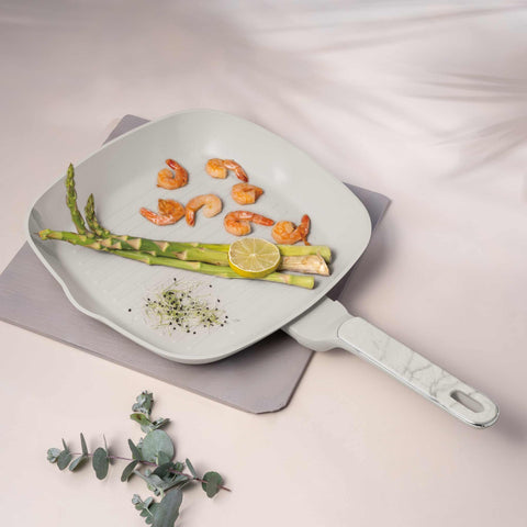 Product image of Grill pan 28cm. Part of the Sahara Marble Collection . Features: • Material: forged aluminum with non-stick titanPro coating • Grill pan Ø28*4,1 cm 2,1L • Color: matt cream, marble REGISTERED DESIGN BY BERLINGER .... (Conceptual view). Official Berlinger Haus product, boosted by Promintra sl.