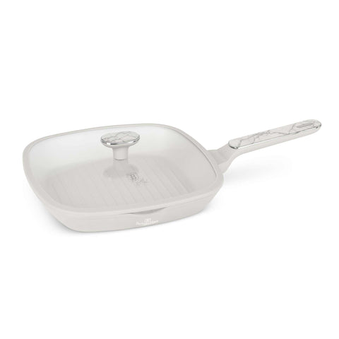 Product image of Grill pan with lid 28cm. Part of the Sahara Marble Collection . Features: • Material: forged aluminum with non-stick titanPro coating • Grill pan with lid Ø28*4,1 cm 2,1L • Color: matt cream, marble REGISTERED DESIGN BY B.... (Studio view). Official Berlinger Haus product, boosted by Promintra sl.