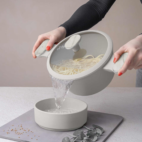 Product image of Casserole with lid 20cm. Part of the Sahara Marble Collection . Features: • Material: forged aluminum with non-stick titanPro coating • Casserole with lid Ø20*11 cm 2,6L • Color: matt cream, marble REGISTERED DESIGN BY BE.... (Studio view). Official Berlinger Haus product, boosted by Promintra sl.