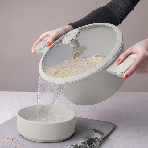 Product image of Casserole with lid 24cm. Part of the Sahara Marble Collection . Features: • Material: forged aluminum with non-stick titanPro coating • Casserole with lid Ø24*12,5 cm 4,3L • Color: matt cream, marble REGISTERED DESIGN BY .... (Studio view). Official Berlinger Haus product, boosted by Promintra sl.