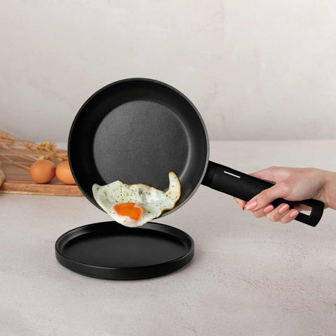 Product image of Frypan 20cm. Part of the Matte Black Collection . Features: • Material: forged aluminum with non-stick titanPro coating • Frypan Ø20*4,5 cm 1,0L • Color: black- silver. (Studio view). Official Berlinger Haus product, boosted by Promintra sl.