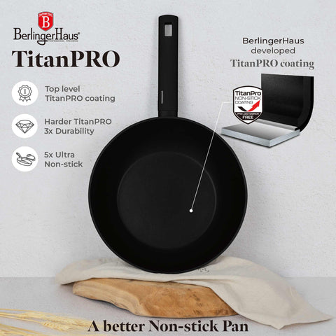 Product image of Wok 28cm. Part of the Matte Black Collection . Features: • Material: forged aluminum with non-stick titanPro coating • Wok Ø28*7,8 cm 3,1L • Color: black- silver. (Studio view). Official Berlinger Haus product, boosted by Promintra sl.