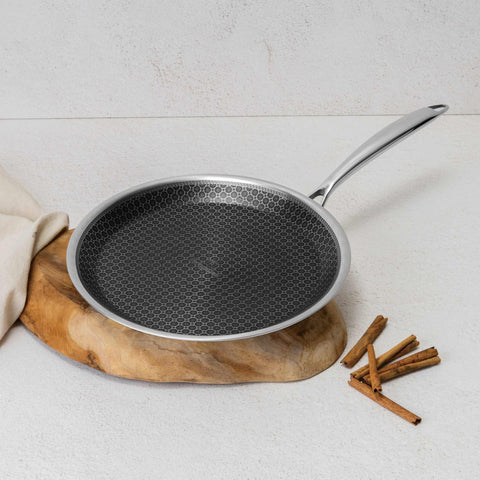 Product image of Pancake pan 26cm. Part of the Eternal Collection . Features: • Material: stainless steel with laser-cut surface • Size: 26*2 cm REGISTERED DESIGN BY BERLINGER HAUS!. (Studio view). Official Berlinger Haus product, boosted by Promintra sl.