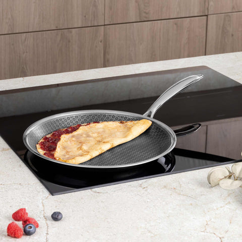 Product image of Pancake pan 26cm. Part of the Eternal Collection . Features: • Material: stainless steel with laser-cut surface • Size: 26*2 cm REGISTERED DESIGN BY BERLINGER HAUS!. (Studio view). Official Berlinger Haus product, boosted by Promintra sl.