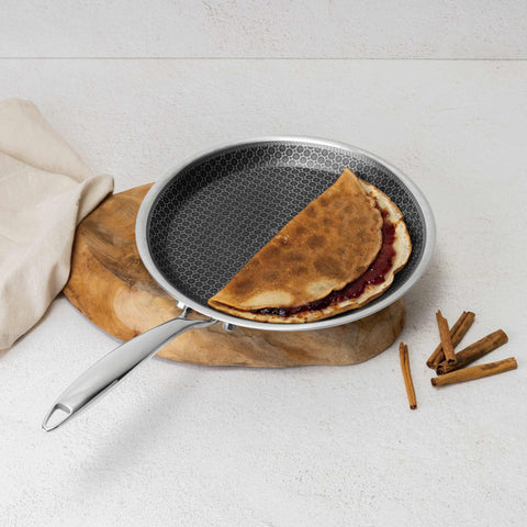 Product image of Pancake pan 26cm. Part of the Eternal Collection . Features: • Material: stainless steel with laser-cut surface • Size: 26*2 cm REGISTERED DESIGN BY BERLINGER HAUS!. (Studio view). Official Berlinger Haus product, boosted by Promintra sl.