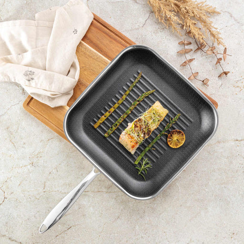Product image of Grill pan 28cm. Part of the Eternal Collection . Features: • Material: stainless steel with laser-cut surface • Size: 28*4 cm REGISTERED DESIGN BY BERLINGER HAUS!. (Studio view). Official Berlinger Haus product, boosted by Promintra sl.