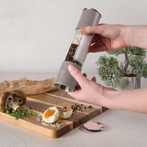 Product image of 2in1 pepper and salt mill. Part of the Taupe Collection . Features: • Material: stainless steel with CERAMIC grinder • Color: matt taupe. (Studio view). Official Berlinger Haus product, boosted by Promintra sl.