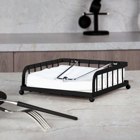 Product image of Napkin holder. Part of the Black Vantage Collection/Matte Black Collection/Black Silver Collection . Features: • Material: iron • Size: 18,5*18,5*6,2 cm • Color: matt black. (Conceptual view). Official Berlinger Haus product, boosted by Promintra sl.