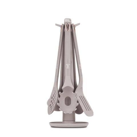 Product image of 6pcs kitchen tool set with stand silicone. Part of the Taupe Collection . Features: • Material: nylon, plastic, silicone • Include: • Soup ladle 1 pc • Cooking spoon 1 pc • Spaghetti ladle 1 pc • Skimmer 1 pc • Slotted turner • Rot.... (Studio view). Official Berlinger Haus product, boosted by Promintra sl.