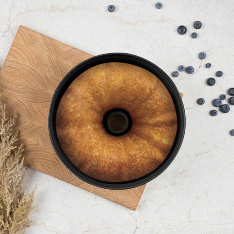 Imatge del producte de les pastilles Bundt de 25 cm. Forma part de la col·lecció Matte Black/Black Rose. Característiques: • Material: acer al carboni amb recobriment antiadherent TitanPro • Mida: 25*10,5 cm • Color: negre mat. (Vista d'estudi). Producte oficial de Berlinger, impulsat per Promintra sl.