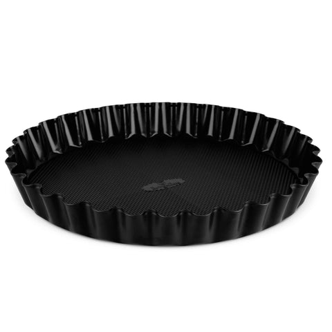 Product image of Tart/cake form 28x3,5cm. Part of the Matte Black Collection/Black Rose Collection . Features: • Material: carbon steel with titanPro non-stick coating • Size: 28*3,5 cm • Color: matt black. (Studio view). Official Berlinger Haus product, boosted by Promintra sl.