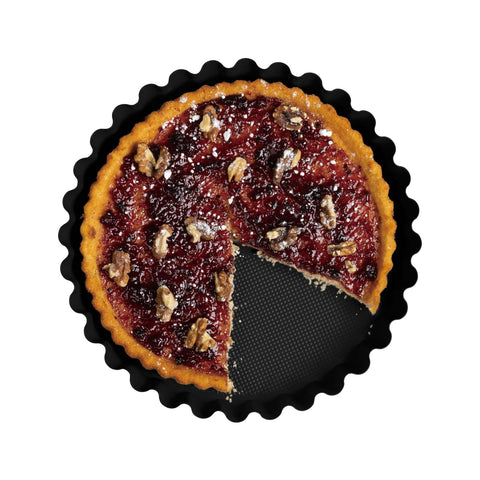 Product image of Tart/cake form 28x3,5cm. Part of the Matte Black Collection/Black Rose Collection . Features: • Material: carbon steel with titanPro non-stick coating • Size: 28*3,5 cm • Color: matt black. (Studio view). Official Berlinger Haus product, boosted by Promintra sl.