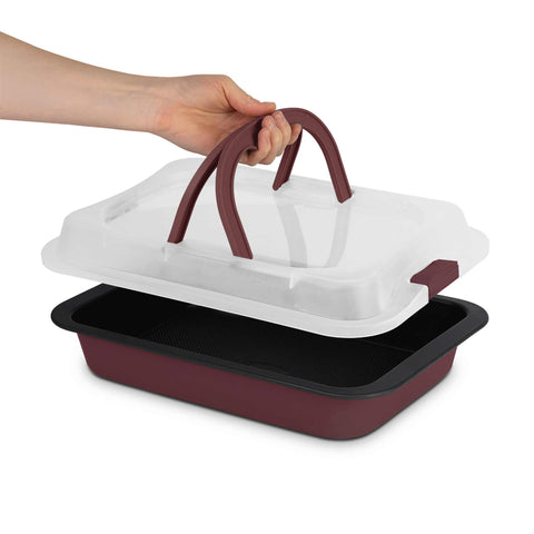 Product image of Oblong roaster with lid. Part of the Leonardo Collection . Features: • Material: carbon steel with titanPro non-stick coating, plastic cover • Size: 36,5*24,5*5,5 cm • Color: matt bordeaux. (Studio view). Official Berlinger Haus product, boosted by Promintra sl.