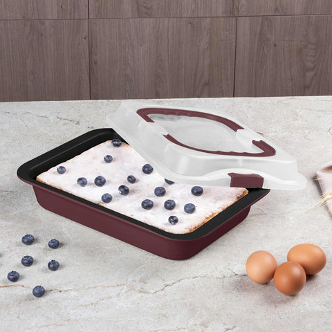 Product image of Oblong roaster with lid. Part of the Leonardo Collection . Features: • Material: carbon steel with titanPro non-stick coating, plastic cover • Size: 36,5*24,5*5,5 cm • Color: matt bordeaux. (Studio view). Official Berlinger Haus product, boosted by Promintra sl.