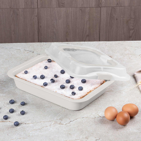 Product image of Oblong roaster with lid. Part of the Sahara Collection . Features: • Material: carbon steel with titanPro non-stick coating, plastic cover • Size: 36,5*24,5*5,5 cm • Color: matt cream. (Studio view). Official Berlinger Haus product, boosted by Promintra sl.