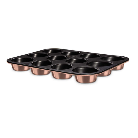 Product image of 12cups muffin pan. Part of the Metallic Line Rose Gold Edition . Features: • Material: carbon steel with titan non-stick coating • Size: 35*26,5*3 cm • Color: metallic rose gold. (Studio view). Official Berlinger Haus product, boosted by Promintra sl.