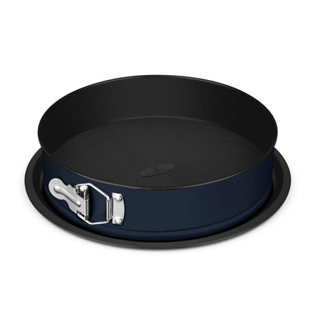 Product image of Round springform 26x6,8cm. Part of the Deep Sea Collection . Features: • Material: carbon steel with titanPro non-stick coating • Size: 26*6,8 cm • Base size: Ø29,9 cm • Color: matt blue. (Studio view). Official Berlinger Haus product, boosted by Promintra sl.