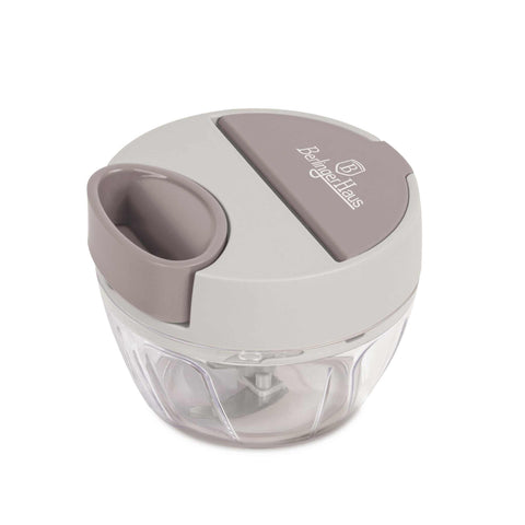 Product image of Pull chopper. Part of the Taupe Collection/Sahara Collection . Features: • Material: stainless steel, plastic • Capacity: 400 ml • Size: 12,5*9,5 cm • Color: cream- taupe. (Studio view). Official Berlinger Haus product, boosted by Promintra sl.