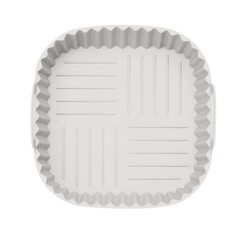 Product image of Silicone air fryer basket. Part of the Sahara Collection . Features: • Air fryer basket • Material: silicone • Size: 21*21*9 cm • Color: cream. (Studio view). Official Berlinger Haus product, boosted by Promintra sl.