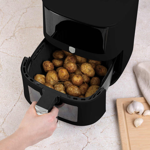 Product image of Silicone air fryer basket. Part of the Black Vantage Collection/Matte Black Collection/Black Silver Collection . Features: • Air fryer basket • Material: silicone • Size: 21*21*9 cm • Color: black. (Studio view). Official Berlinger Haus product, boosted by Promintra sl.