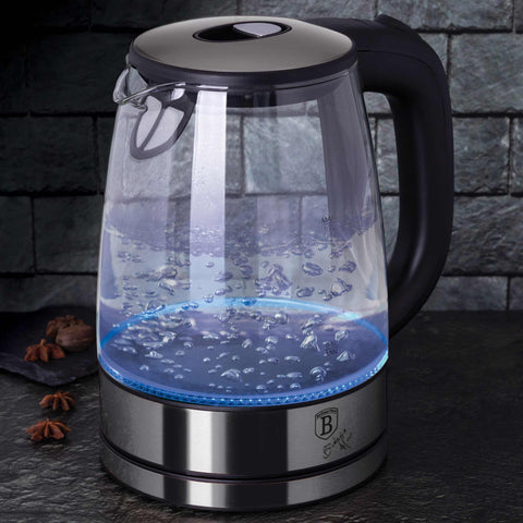 Product image of Electric glass kettle. Part of the Black Vantage Collection/Matte Black Collection/Black Silver Collection/Eternal Collection . Features: • Material: stainless steel and borosilicate glass • Capacity: 1,7L • Voltage: 220-240V,50/60Hz • Power: 1850-2200W • Color: stainless steel. (Studio view). Official Berlinger Haus product, boosted by Promintra sl.
