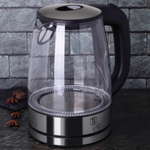 Product image of Electric glass kettle. Part of the Black Vantage Collection/Matte Black Collection/Black Silver Collection/Eternal Collection . Features: • Material: stainless steel and borosilicate glass • Capacity: 1,7L • Voltage: 220-240V,50/60Hz • Power: 1850-2200W • Color: stainless steel. (Studio view). Official Berlinger Haus product, boosted by Promintra sl.
