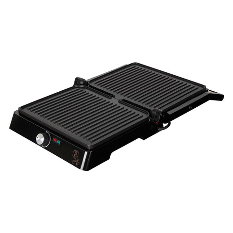 Product image of Electric grill with oil drip pan. Part of the Metallic Line Rose Gold Edition . Features: • Power: 2200W • Voltage: 220-240 V • NON-STICK coating on plate • Plate size: 29*23 cm • Color: rose gold • 2 IN 1 2 TYPES OF OPENING • Opening in.... (Studio view). Official Berlinger Haus product, boosted by Promintra sl.