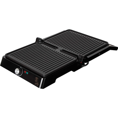 Product image of Electric grill with oil drip pan. Part of the Black Vantage Collection/Matte Black Collection/Black Silver Collection/Eternal Collection . Features: • Power: 2200W • Voltage: 220-240 V • NON-STICK coating on plate • Plate size: 29*23 cm • Color: stainless steel • 2 IN 1 2 TYPES OF OPENING. (Studio view). Official Berlinger Haus product, boosted by Promintra sl.