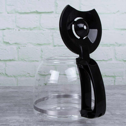 Imatge del producte de la cafetera elèctrica. Forma part de la col·lecció Crystal. Característiques: • Material: plàstic i acer inoxidable • Potència: 800 W • 220-240V 50-60 Hz • Capacitat: 1,5L • Color: xampany fosc. (Vista d'estudi). Producte oficial de Berlinger, impulsat per Promintra sl.