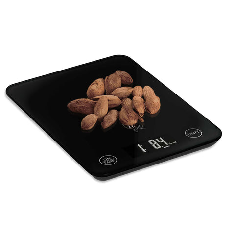Product image of Digital glass kitchen scale capacity 5kg. Part of the Black Vantage Collection/Matte Black Collection/Black Silver Collection . Features: • Material: tempered glass and plastic • Capacity: 5 kg • Size: 19,5*14,5 cm • Weight unit: g/oz/ml/lb/fl • 2 pcs AAA battery included • Color: black. (Studio view). Official Berlinger Haus product, boosted by Promintra sl.