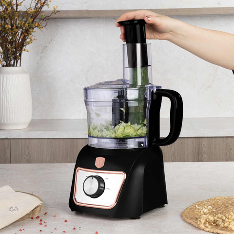 Product image of 8in1 food processor. Part of the Black Rose Collection . Features: • Material: stainless steel, plastic • Voltage: 220-240V 50-60Hz • Power: 500W • Included: • Stainless steel chopper blade • 2-side stainless steel.... (Studio view). Official Berlinger Haus product, boosted by Promintra sl.