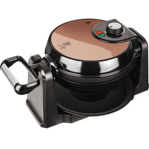 Product image of Rotatable waffle maker with stand. Part of the Metallic Line Rose Gold Edition . Features: • Power: 1000W • Voltage: 220-240 V, 50/60Hz • Plate size: 20,32 cm • Accessory: plastic tray • NON-STICK TITAN black coating on plate • Color: ros.... (Studio view). Official Berlinger Haus product, boosted by Promintra sl.