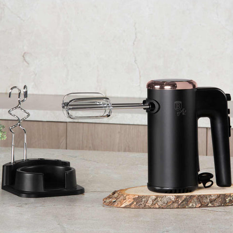 Product image of Hand mixer with stand. Part of the Black Rose Collection . Features: • Material: plastic and stainless steel • Include: • 2 pcs beaters for eggs and cream • 2 pcs hooks for mixing dough • Voltage: 220-240 V, 50/60 Hz.... (Studio view). Official Berlinger Haus product, boosted by Promintra sl.